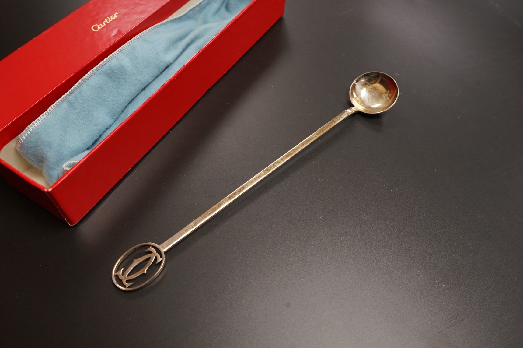 A late 20th century Cartier sterling cocktail stirring spoon, 22.7cm, 33 grams, with Cartier pouch and box.